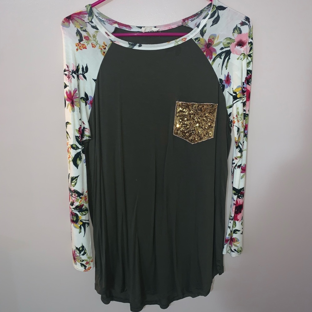 Boutique womens top size medium/large. Olive green and floral pattern